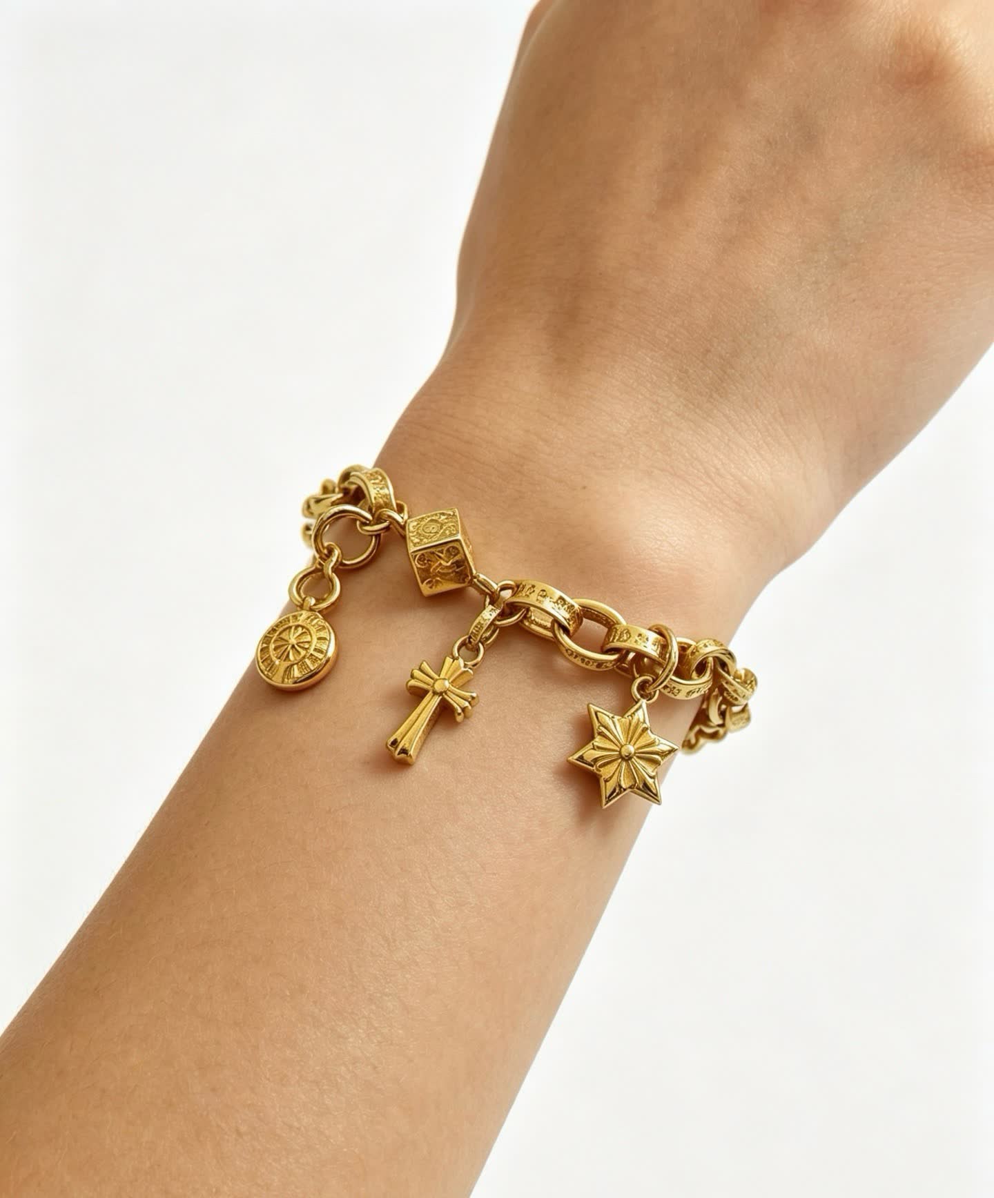 Chrome Hearts Gold Tone Charm Bracelet with Cross, Star, and Coin Charms